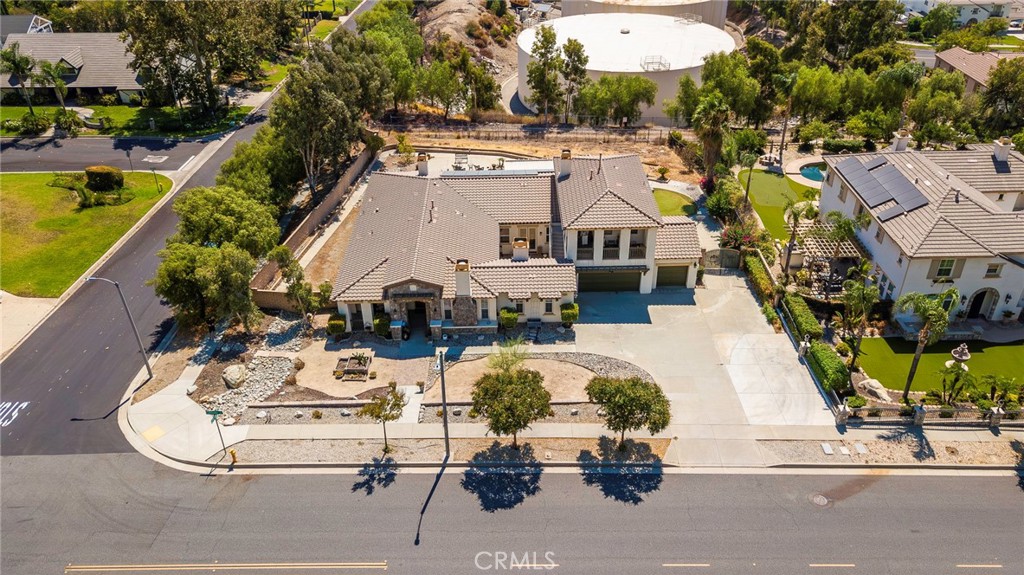 10281 Hillside Road Rancho Cucamonga, CA 91737 - Photo 3 of 60 an aerial view of a house with swimming pool