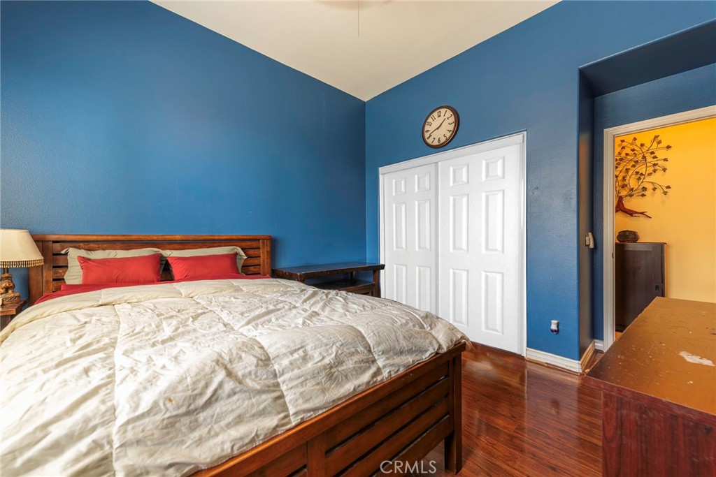 10281 Hillside Road Rancho Cucamonga, CA 91737 - Photo 32 of 60 a bedroom with a bed and a window
