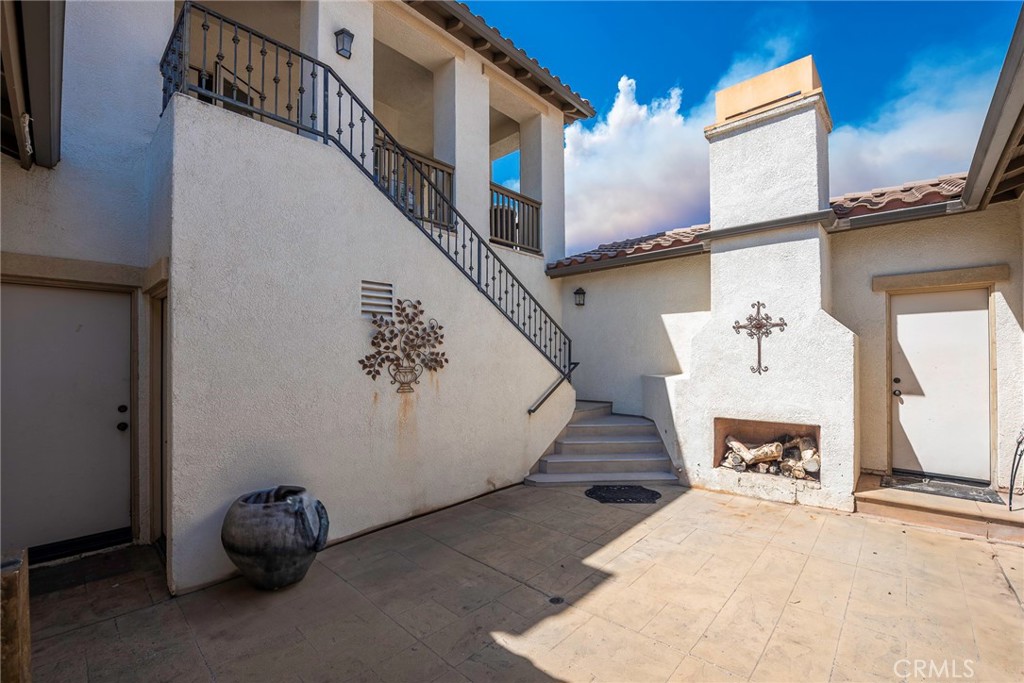 10281 Hillside Road Rancho Cucamonga, CA 91737 - Photo 44 of 60 a view of a hallway with staircase