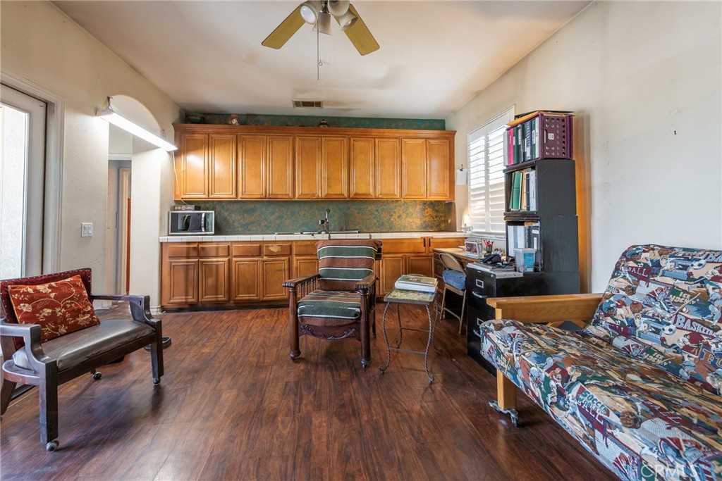 10281 Hillside Road Rancho Cucamonga, CA 91737 - Photo 47 of 60 a living room with furniture and a large window