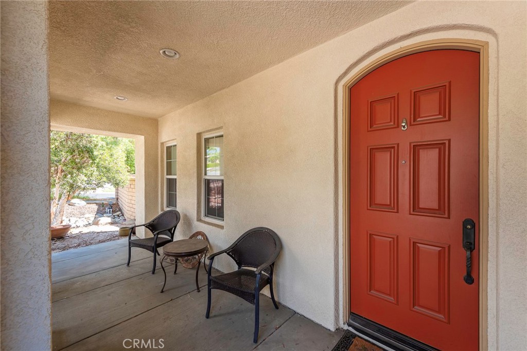 10281 Hillside Road Rancho Cucamonga, CA 91737 - Photo 8 of 60 a living room with furniture and a window