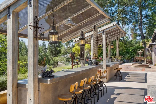 a view of yard with patio