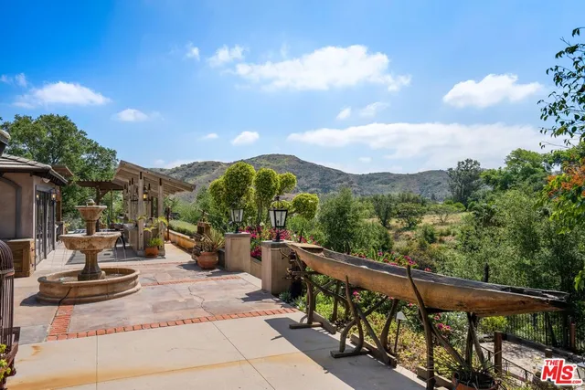 a view of a street with sitting area