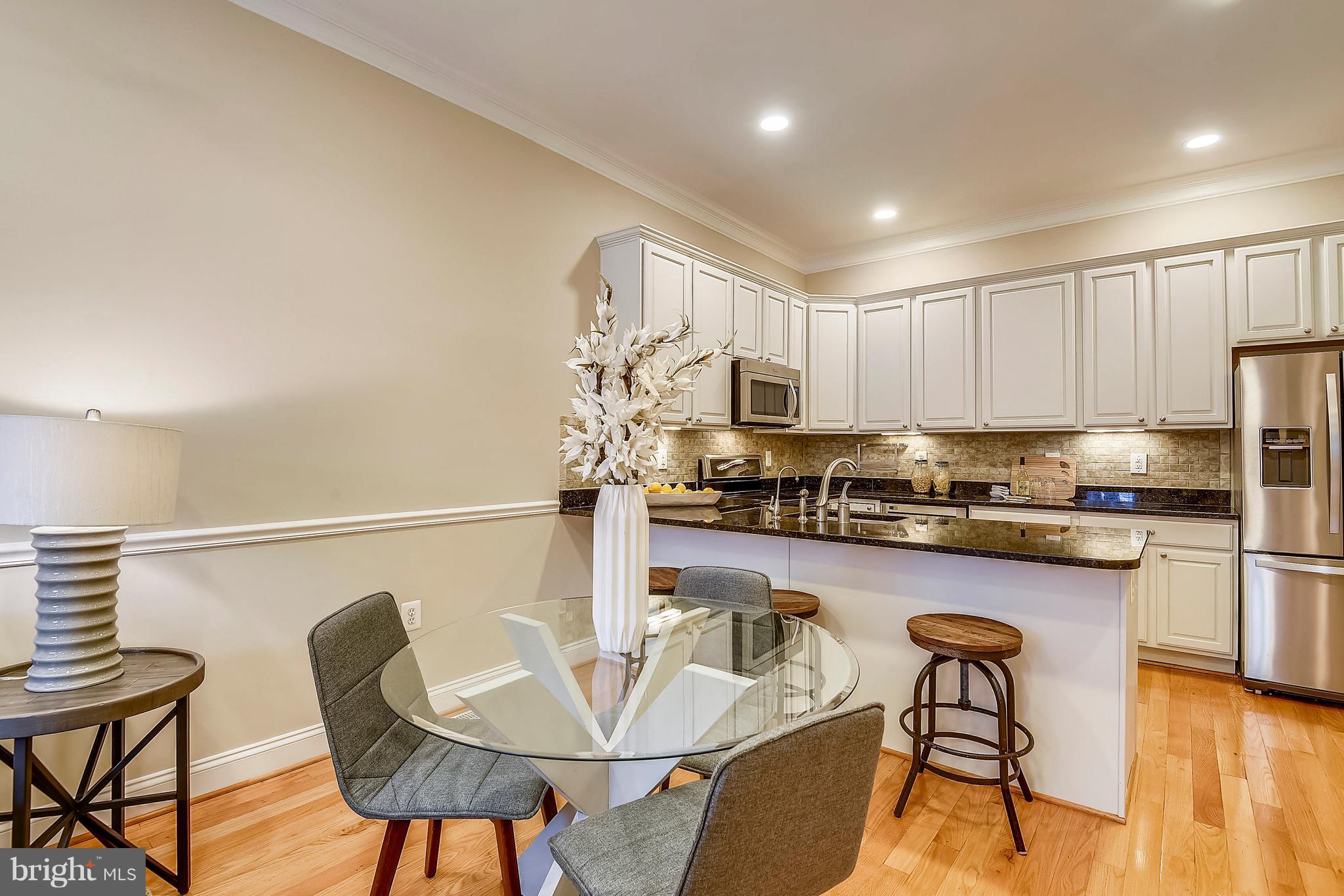 1634 6th Street Northwest, Unit 1 Washington, DC 20001 - Photo 8 of 36 Granite counters in kitchen.