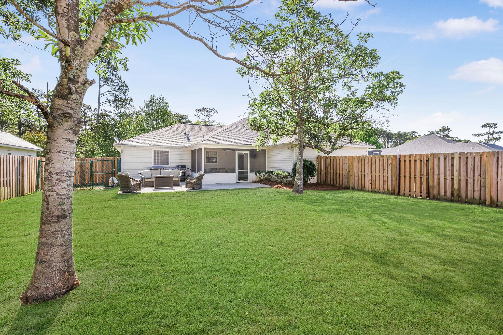 24710 Gulf Bay Road Orange Beach, AL 36561 - Photo 19 of 20 Fenced in Back Yard