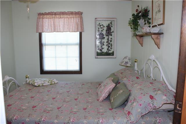 1077 Gnat Hill Road Manchester, TN 37355 - Photo 11 of 20 This room is a office, but if you added a closet you could use it as a 3rd bedroom.
