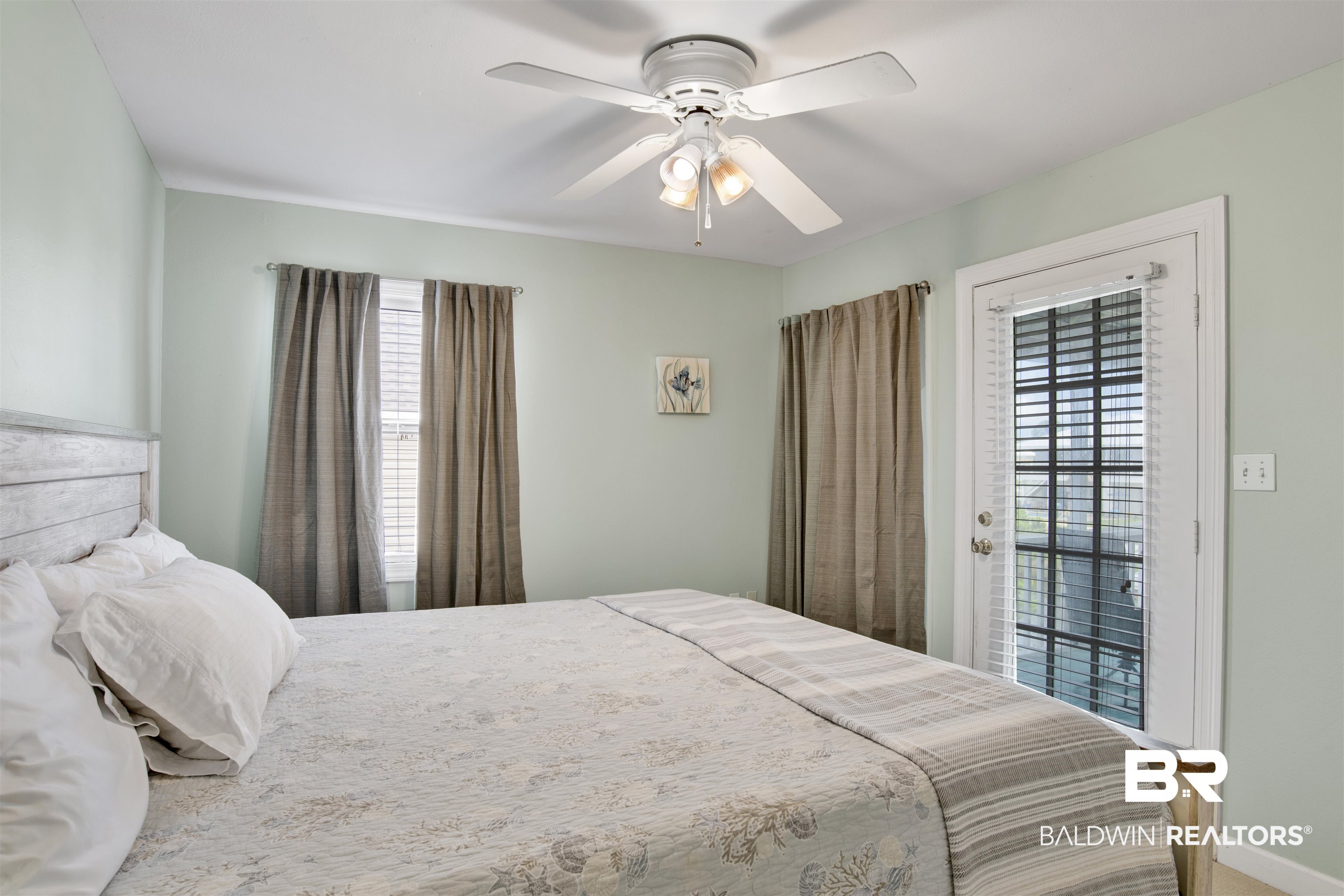 33093 River Road Orange Beach, AL 36561 - Photo 16 of 30 Bedroom featuring access to exterior and ceiling fan