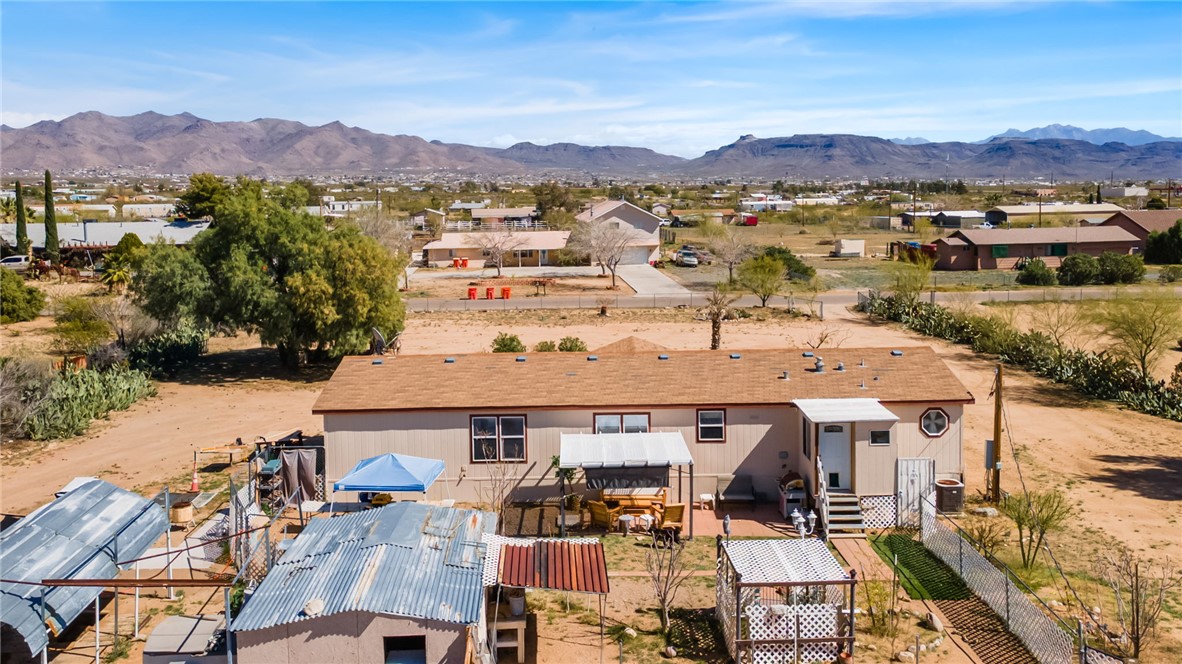 3411 Mayer Road Golden Valley, AZ 86413 - Photo 43 of 49 Drone / aerial view of a mountain backdrop