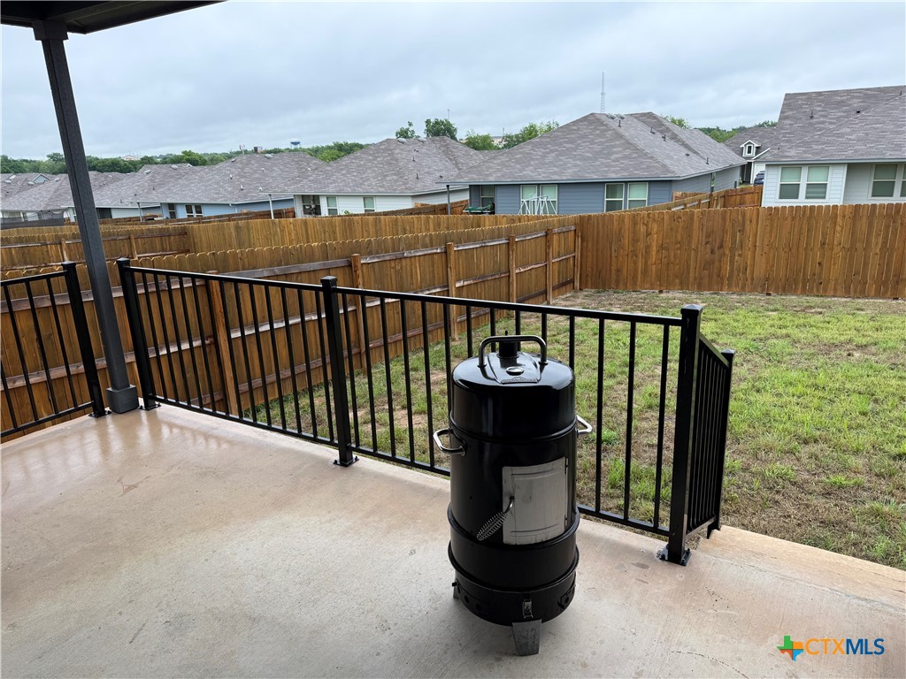 1335 Brookfield Street Temple, TX 76504 - Photo 6 of 15 a view of a two chairs with the roof deck