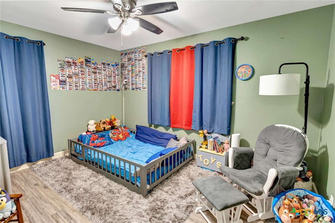 401 Viking Street Victoria, TX 77905 - Photo 11 of 20 a bedroom with a bed and window