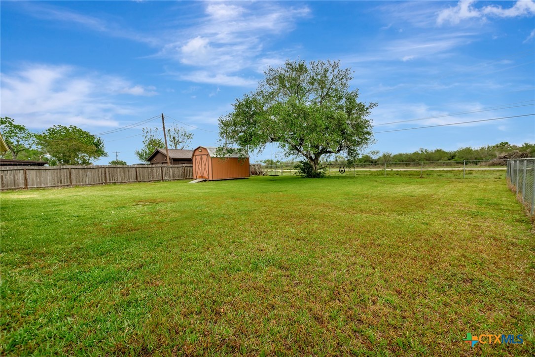 401 Viking Street Victoria, TX 77905 - Photo 20 of 20 a view of a ocean with a houses in the background