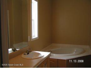 1130 Grapefruit Road Southeast Palm Bay, FL 32909 - Photo 4 of 4 Bathroom 1130 SE Palm Bay - Copy