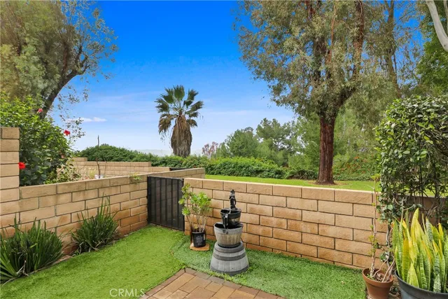 a view of a terrace with a garden