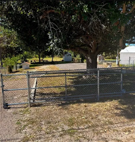a view of a bench in a yard