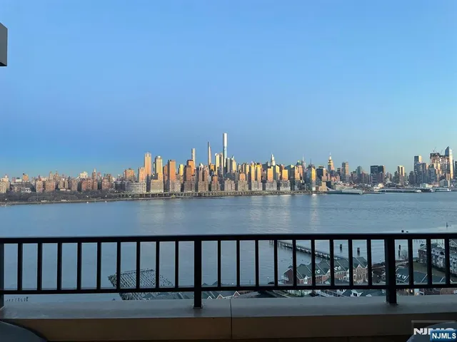 a view of a chairs and table in patio