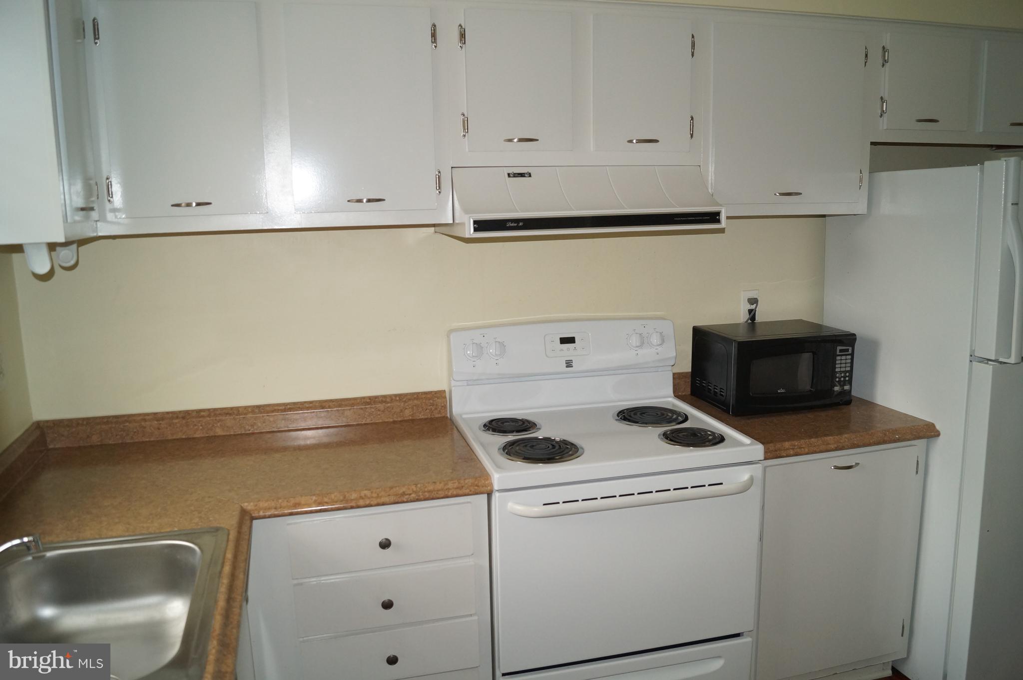 42 Ritters Ridge Court Owings Mills, MD 21117 - Photo 5 of 12 a utility room with dryer and washer