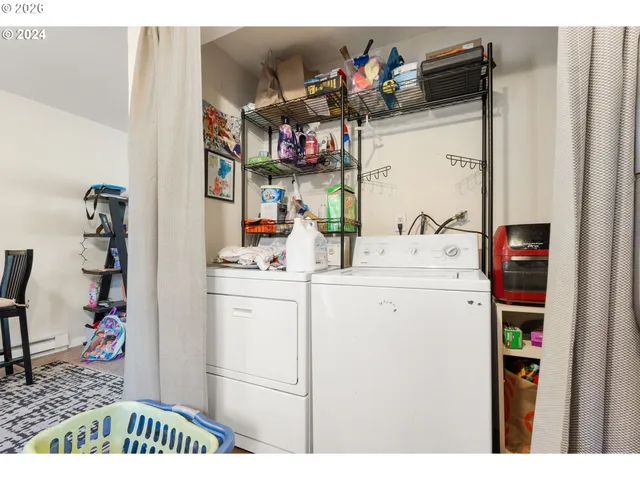 a storage room with washer and dryer