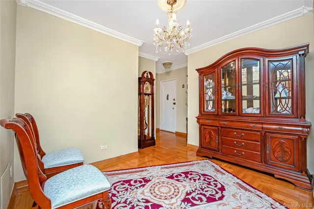 a bedroom with a bed and a dresser in it