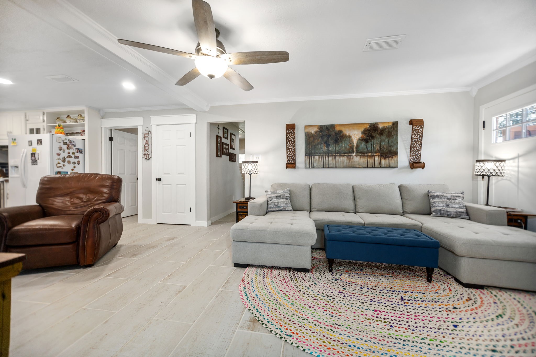 160 Dailey Road Crockett, TX 75835 - Photo 14 of 40 a living room with furniture a ceiling fan and a rug