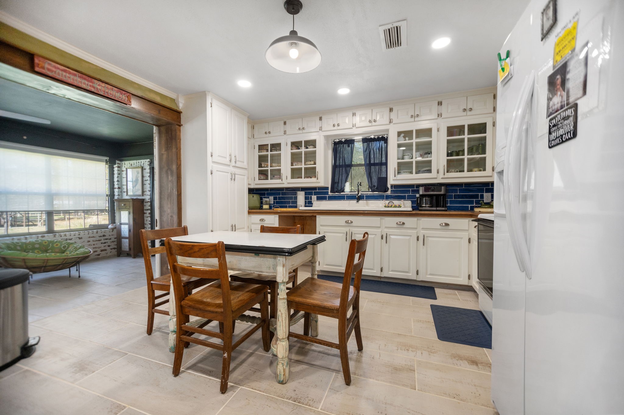 160 Dailey Road Crockett, TX 75835 - Photo 18 of 40 a kitchen with a table and chairs