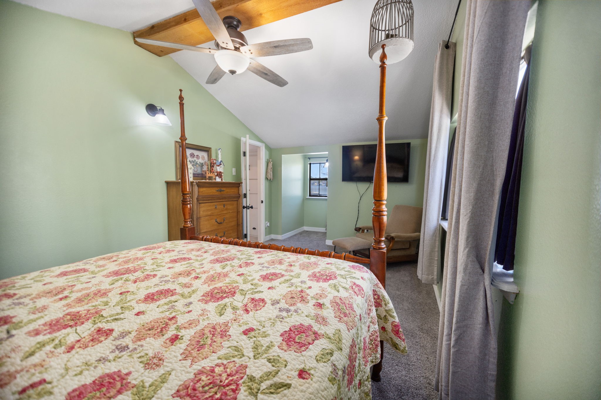 160 Dailey Road Crockett, TX 75835 - Photo 30 of 40 a bedroom with a bed and a chandelier