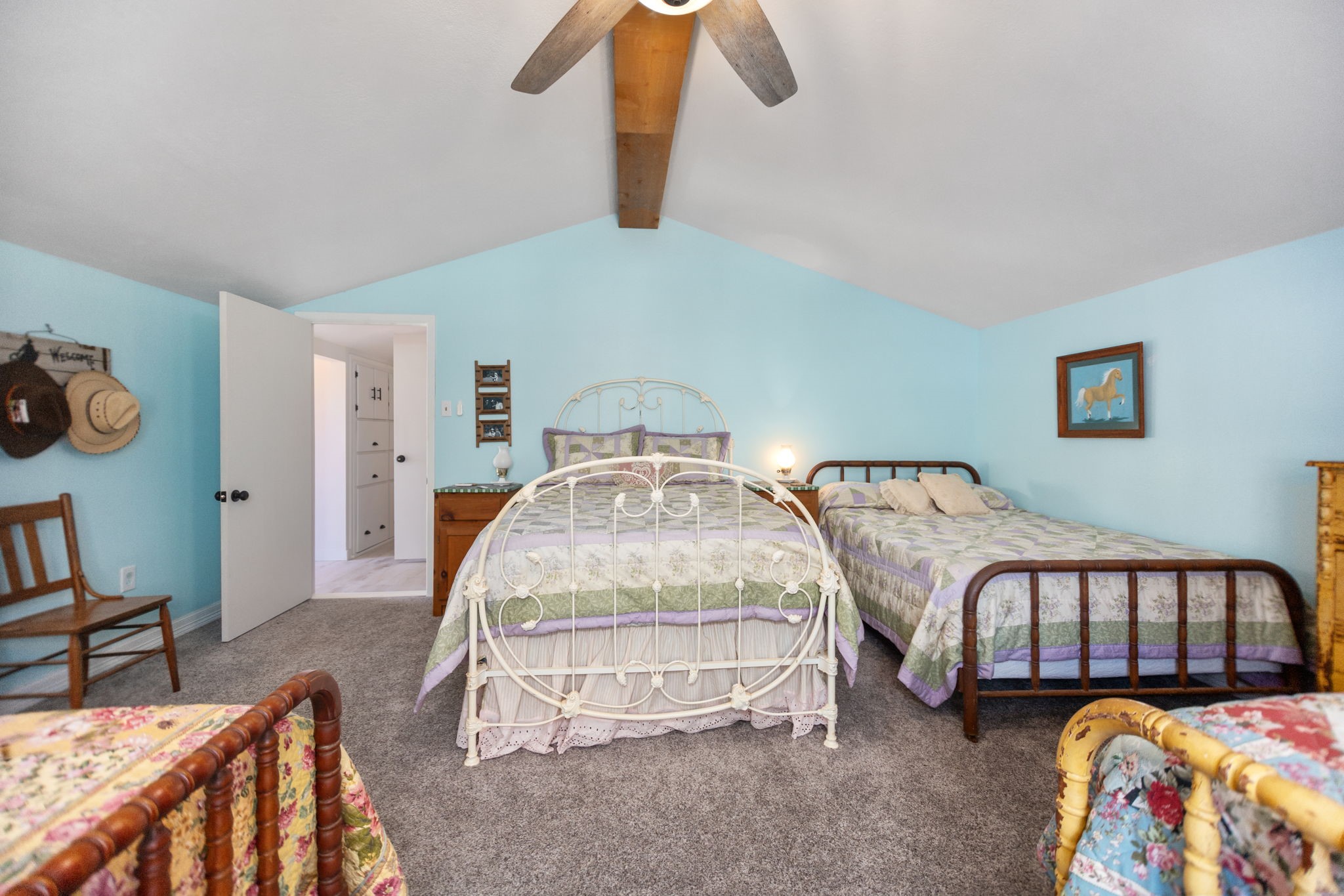 160 Dailey Road Crockett, TX 75835 - Photo 34 of 40 a bedroom with two beds and painting on the wall