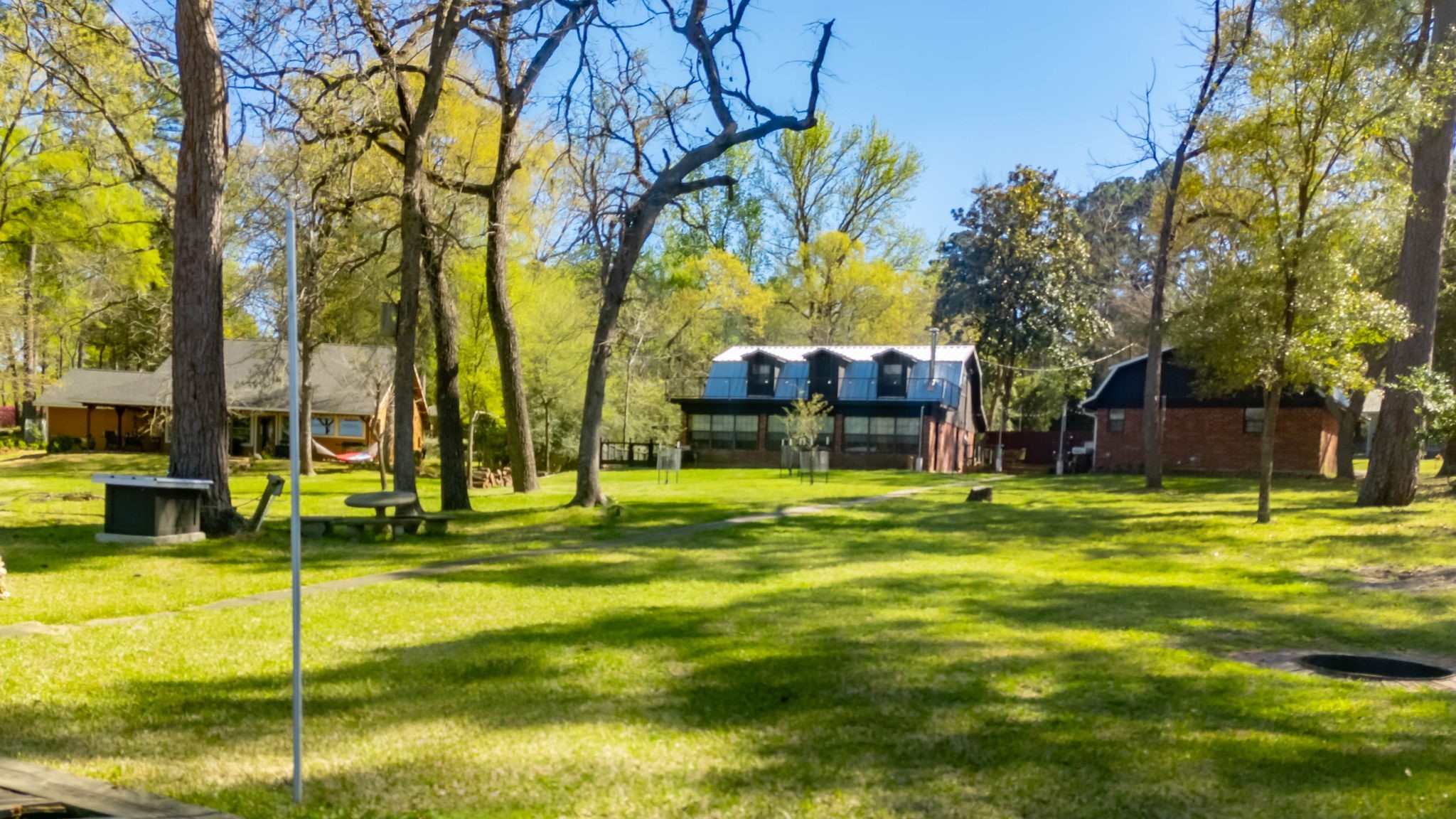 160 Dailey Road Crockett, TX 75835 - Photo 9 of 40 a swimming pool with trees in the background