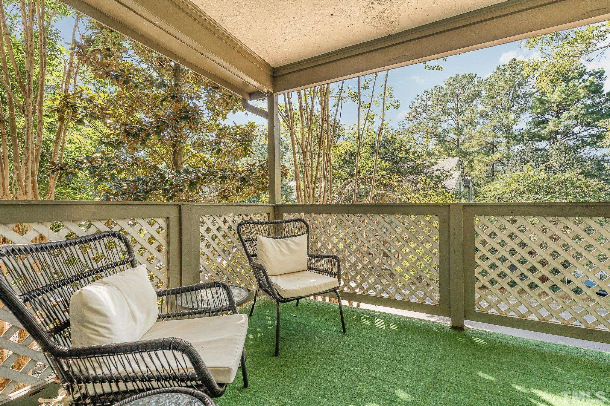 101 Autumn Chase Drive Raleigh, NC 27613 - Photo 15 of 18 a view of a chair and table in the garden
