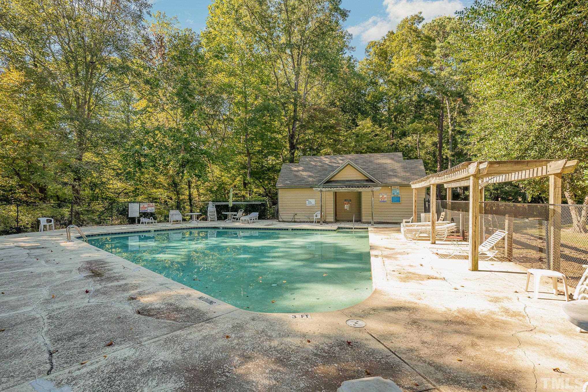 101 Autumn Chase Drive Raleigh, NC 27613 - Photo 18 of 18 a front view of a house with a yard