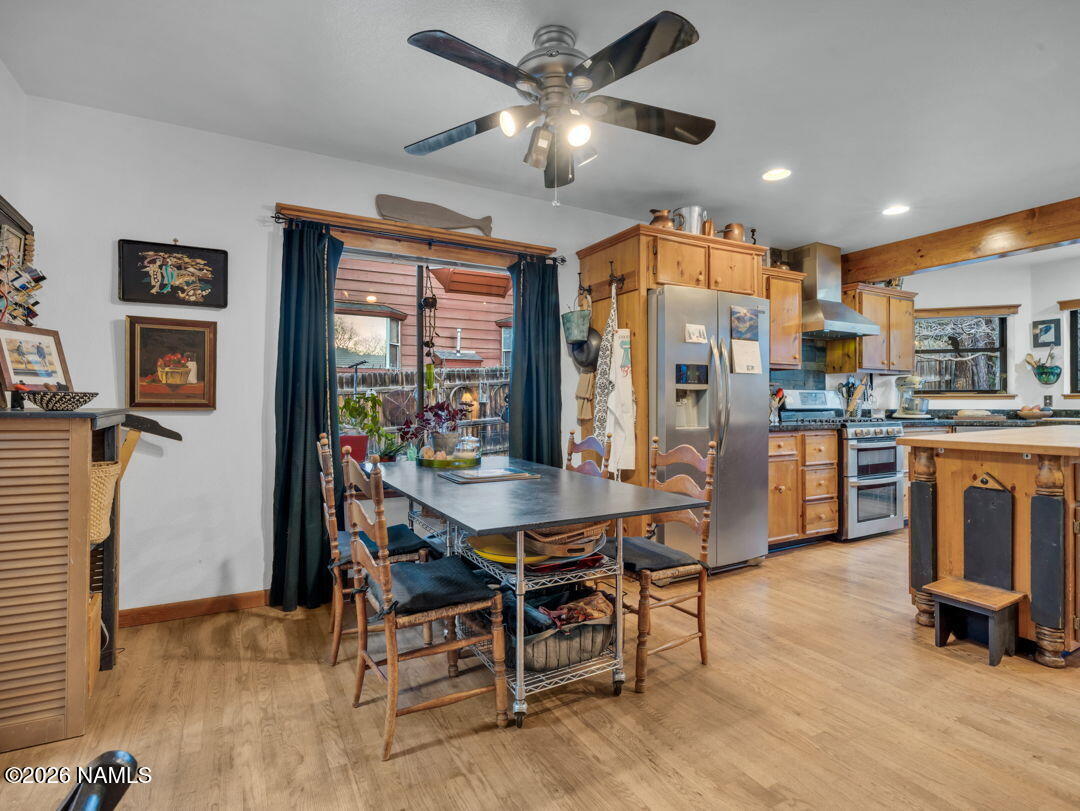 1005 Park Way Williams, AZ 86046 - Photo 15 of 45 a view of a dining room with furniture window and wooden floor