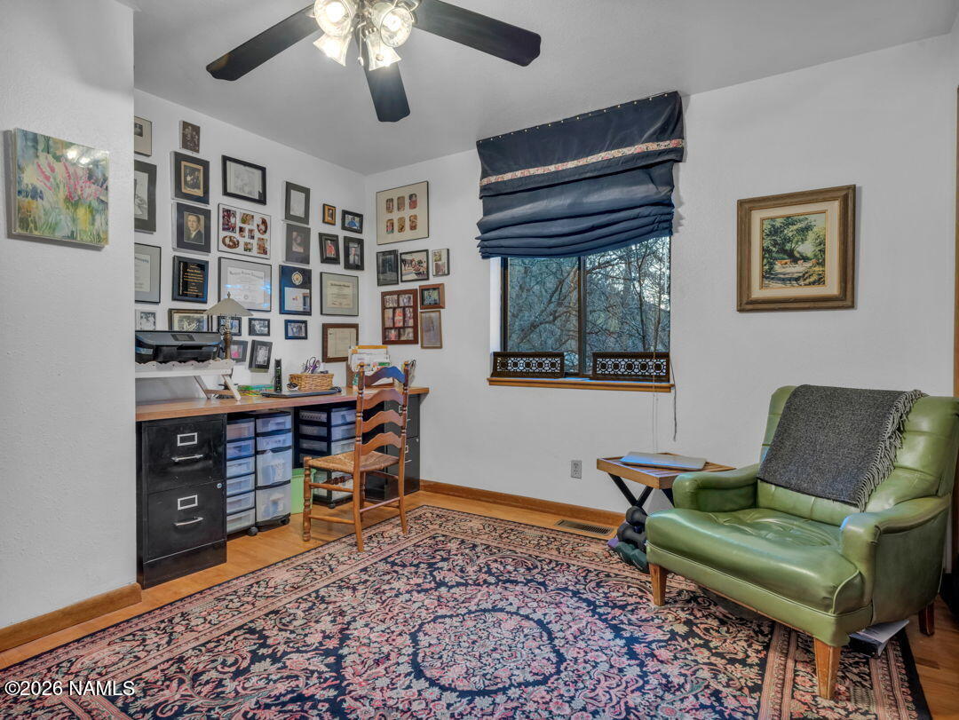 1005 Park Way Williams, AZ 86046 - Photo 23 of 45 a living room with furniture and a window