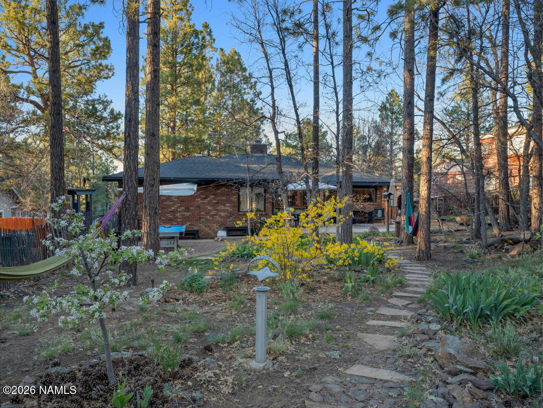 1005 Park Way Williams, AZ 86046 - Photo 40 of 45 a view of a chair and table in the garden