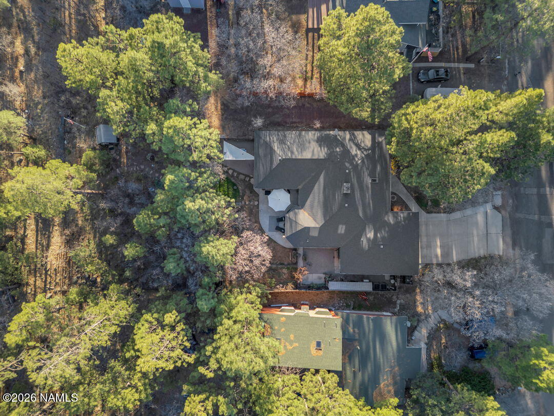 1005 Park Way Williams, AZ 86046 - Photo 6 of 45 a aerial view of a house with a yard and large trees