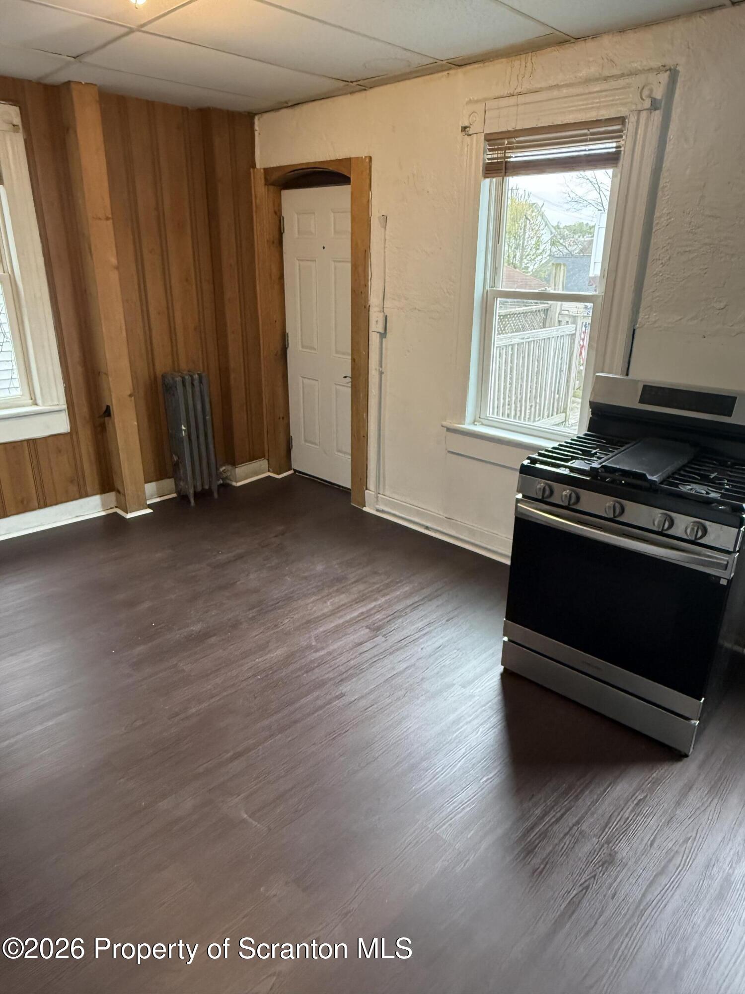 2 Ferguson Place Dunmore, PA 18509 - Photo 11 of 33 an empty room with wooden floor and windows