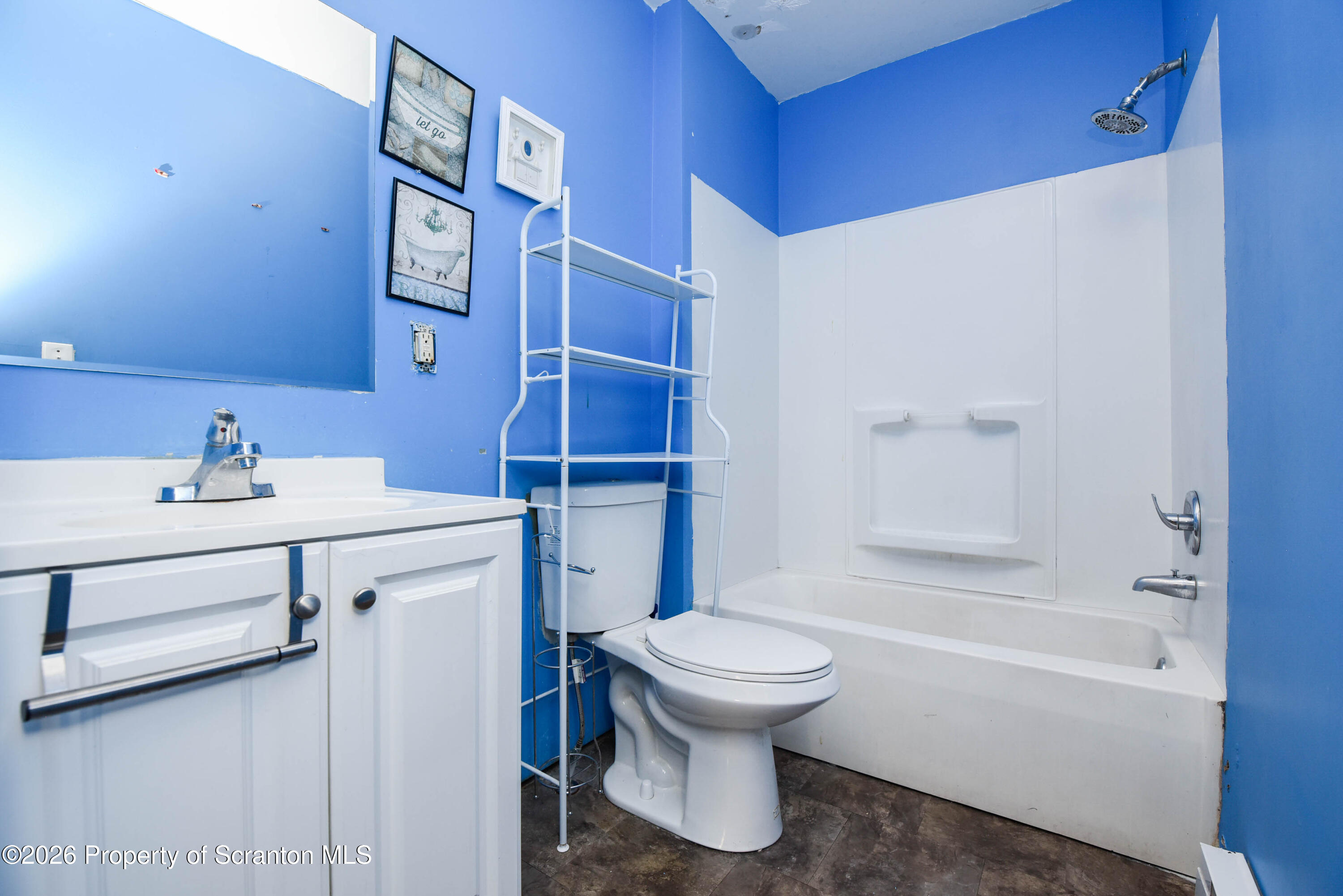 2 Ferguson Place Dunmore, PA 18509 - Photo 14 of 33 a bathroom with a sink a toilet and shower