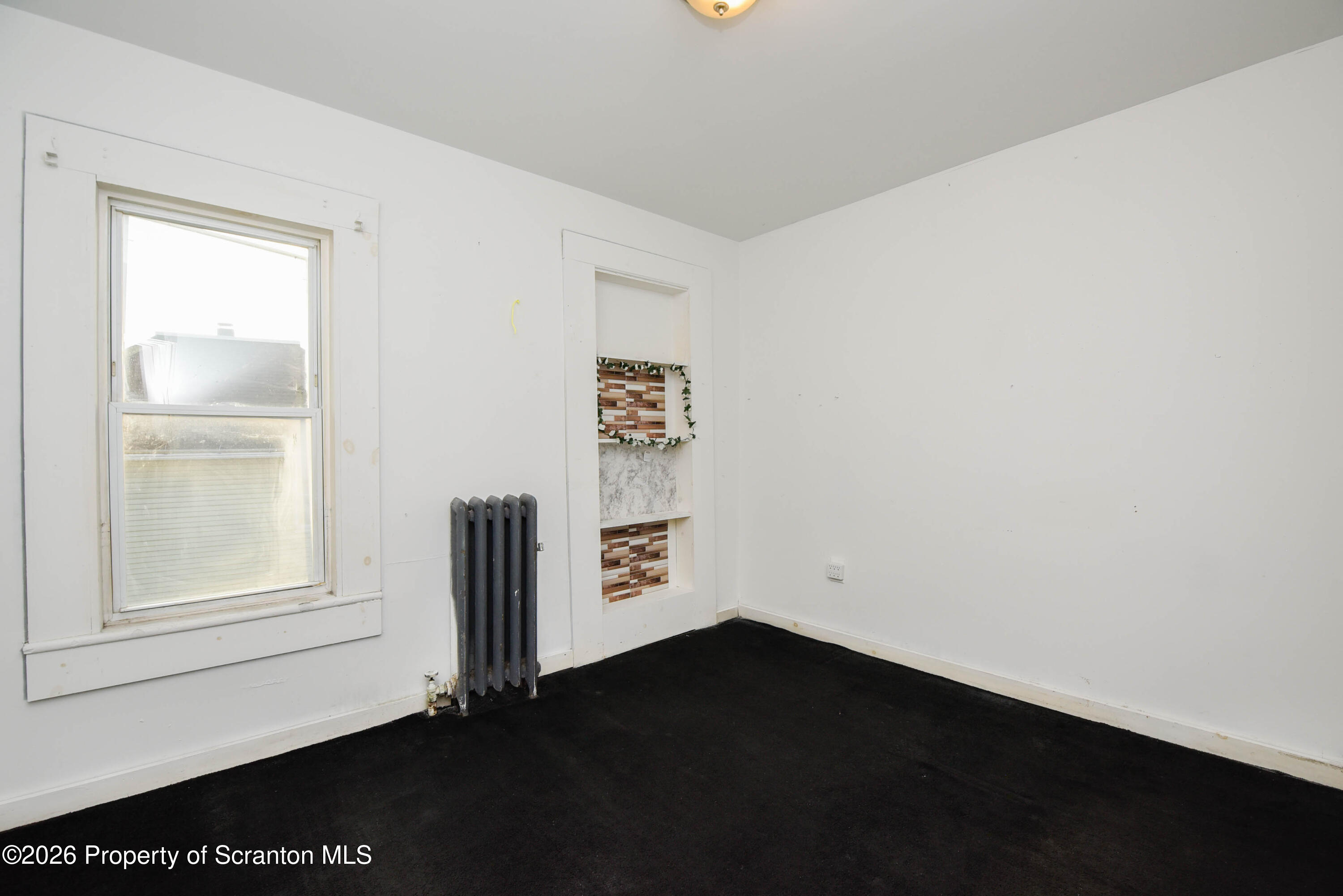 2 Ferguson Place Dunmore, PA 18509 - Photo 16 of 33 an empty room with windows