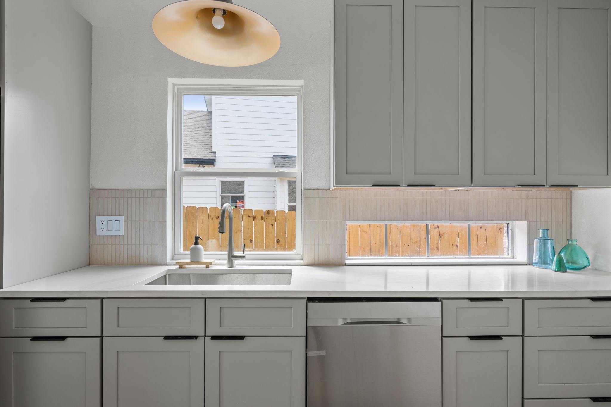 11604 Loweswater Lane Austin, TX 78754 - Photo 11 of 34 a kitchen with a sink and a window