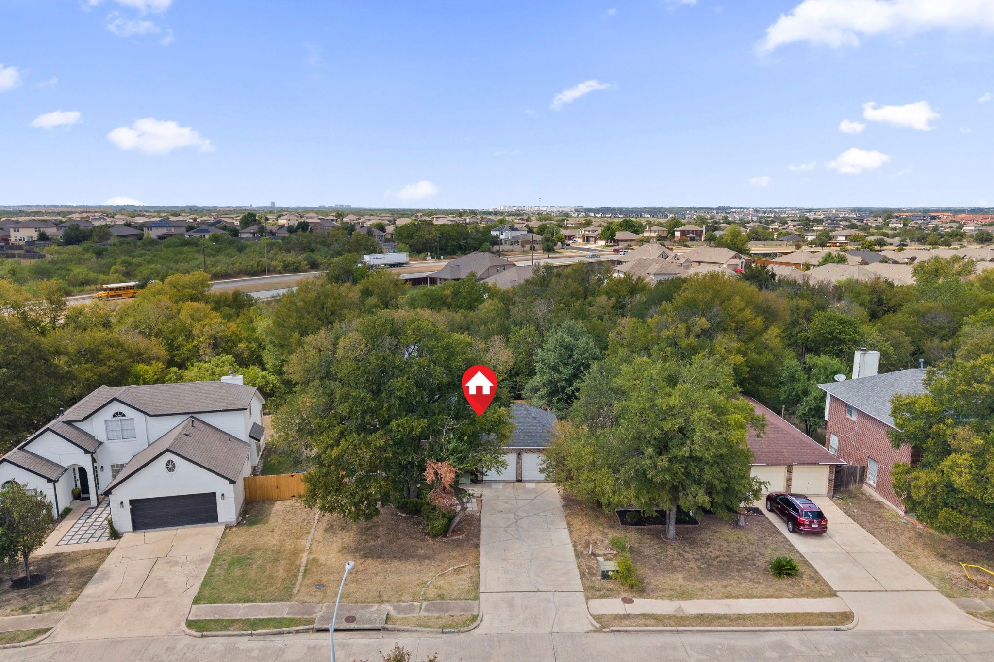 11604 Loweswater Lane Austin, TX 78754 - Photo 30 of 34 an aerial view of a house with a yard