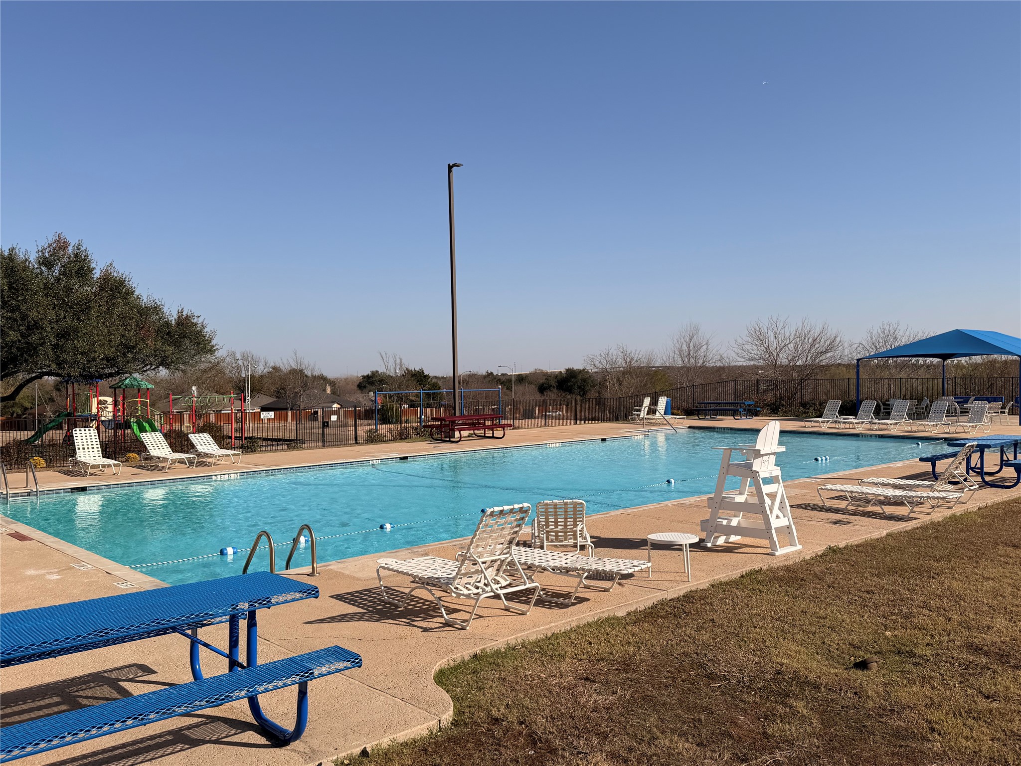 11604 Loweswater Lane Austin, TX 78754 - Photo 33 of 34 a view of a lake with boats and a bench