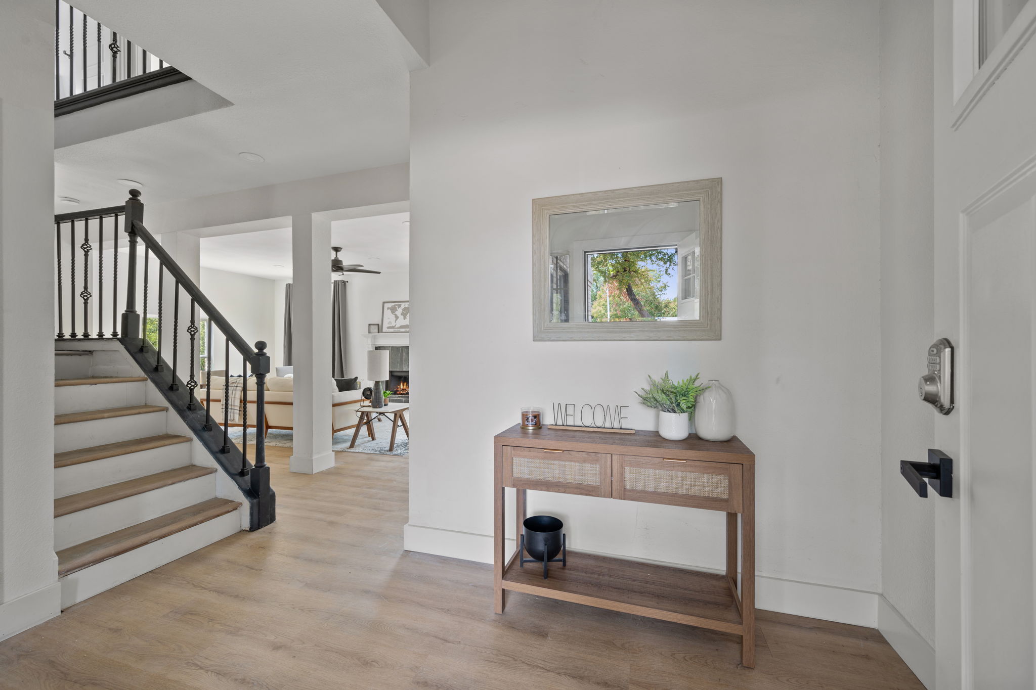 11604 Loweswater Lane Austin, TX 78754 - Photo 5 of 34 a workspace with wooden floor and a potted plant
