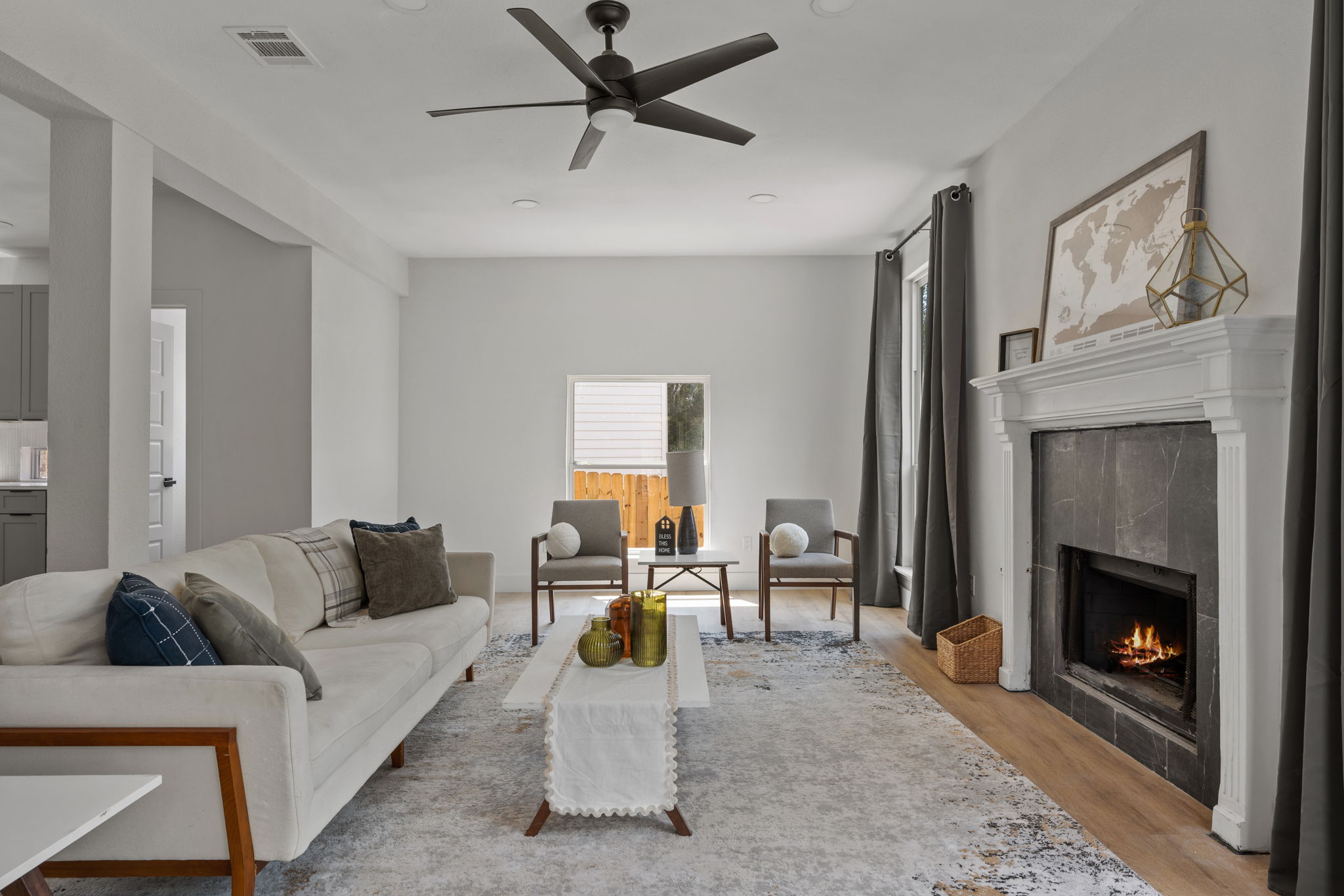 11604 Loweswater Lane Austin, TX 78754 - Photo 7 of 34 a living room with furniture and a fireplace