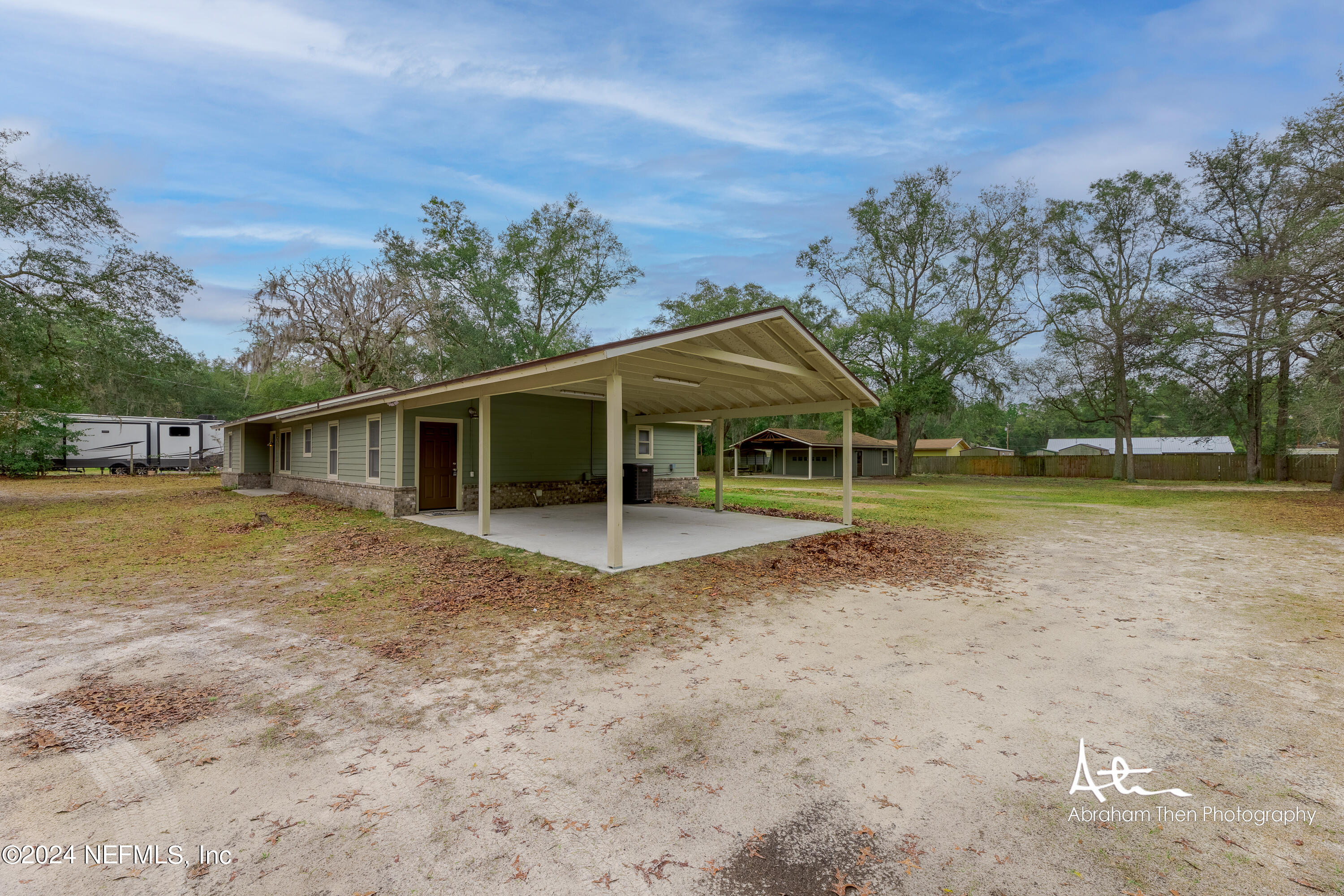 4274 Chokeberry Road Middleburg, FL 32068 - Photo 3 of 37 Side View Carport