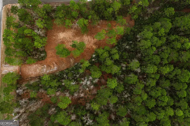a view of a lake with a house