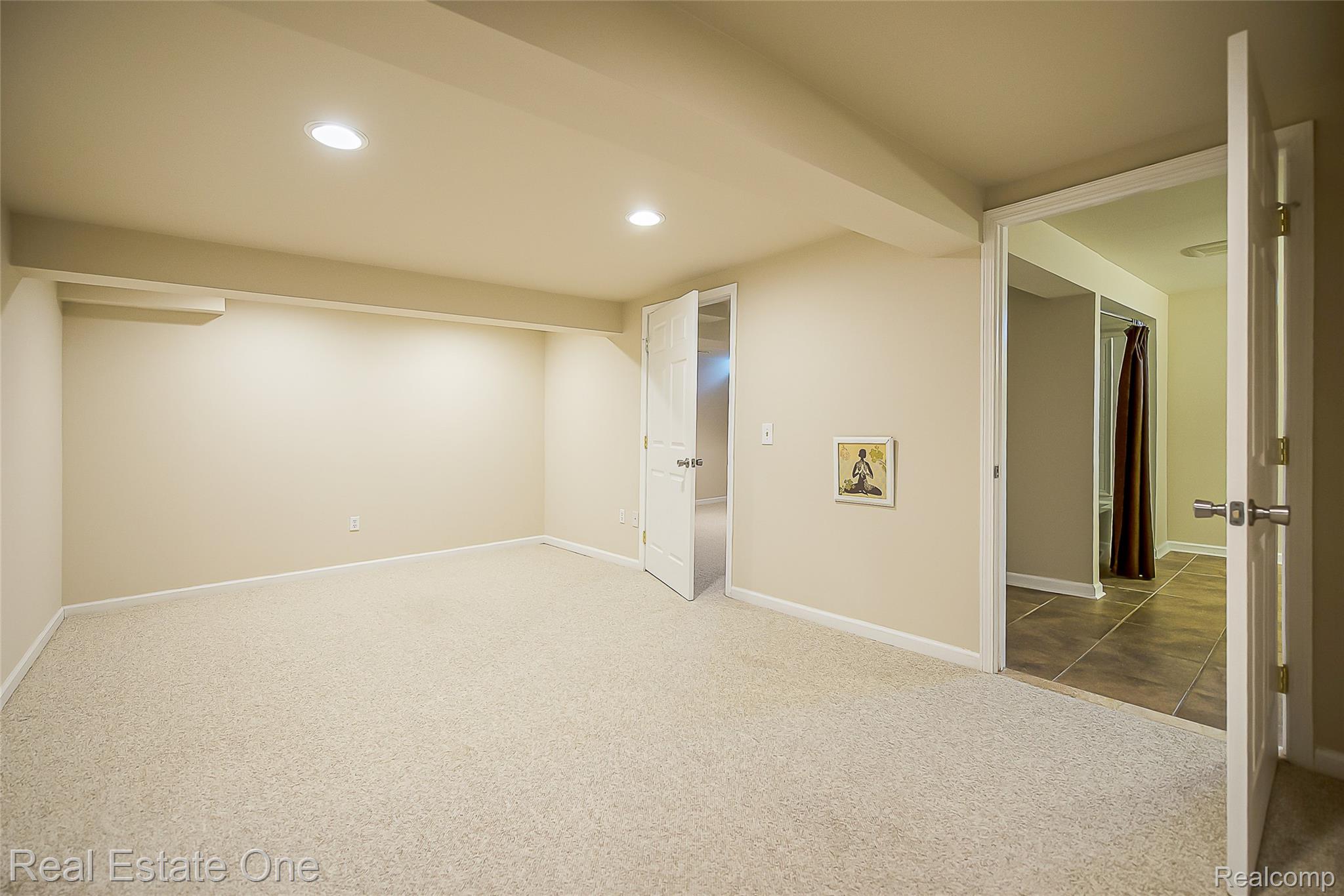 1013 Rochelle Park Drive Rochester, MI 48307 - Photo 48 of 74 Recessed ceiling lighting, neutral carpet flooring, and painted walls