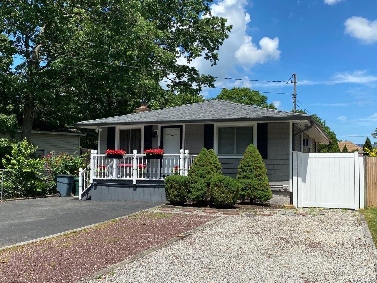 97 Mastic Boulevard Mastic, NY 11950 - Photo 1 of 1 front view of a house with a yard