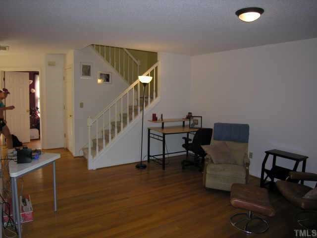 106 Timber Ridge Drive Durham, NC 27713 - Photo 2 of 10 This living room has refinished hardwoods and fireplace. Other