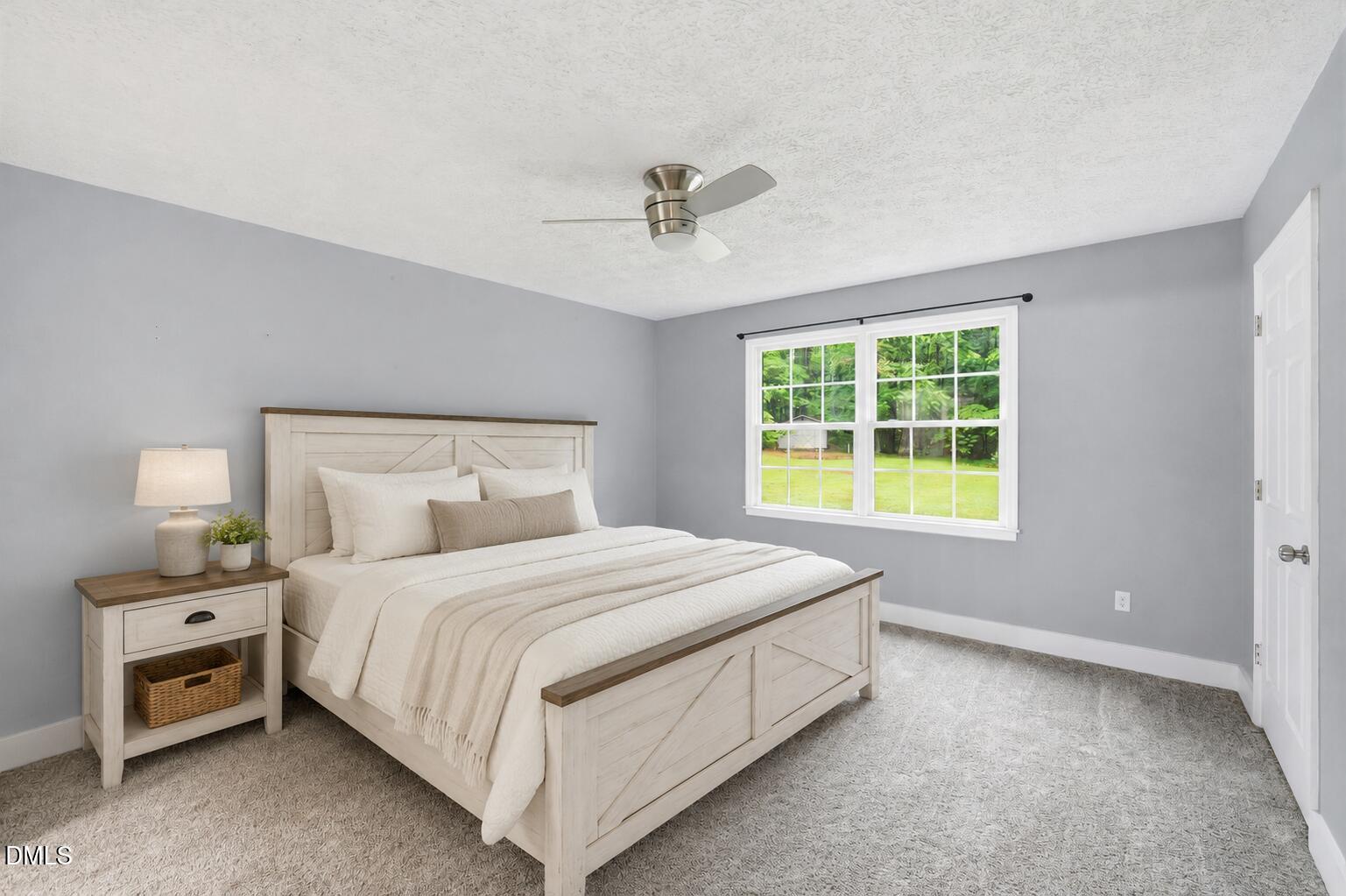1925 Old Allensville Road Roxboro, NC 27574 - Photo 45 of 58 a bedroom with a bed and a window