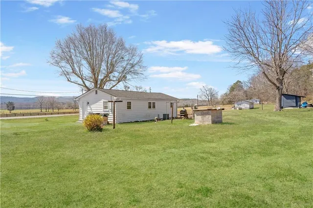 a house view with a garden space