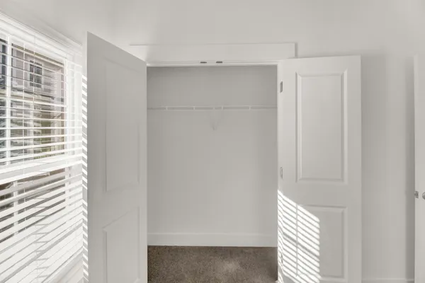 a view of a closet in a room
