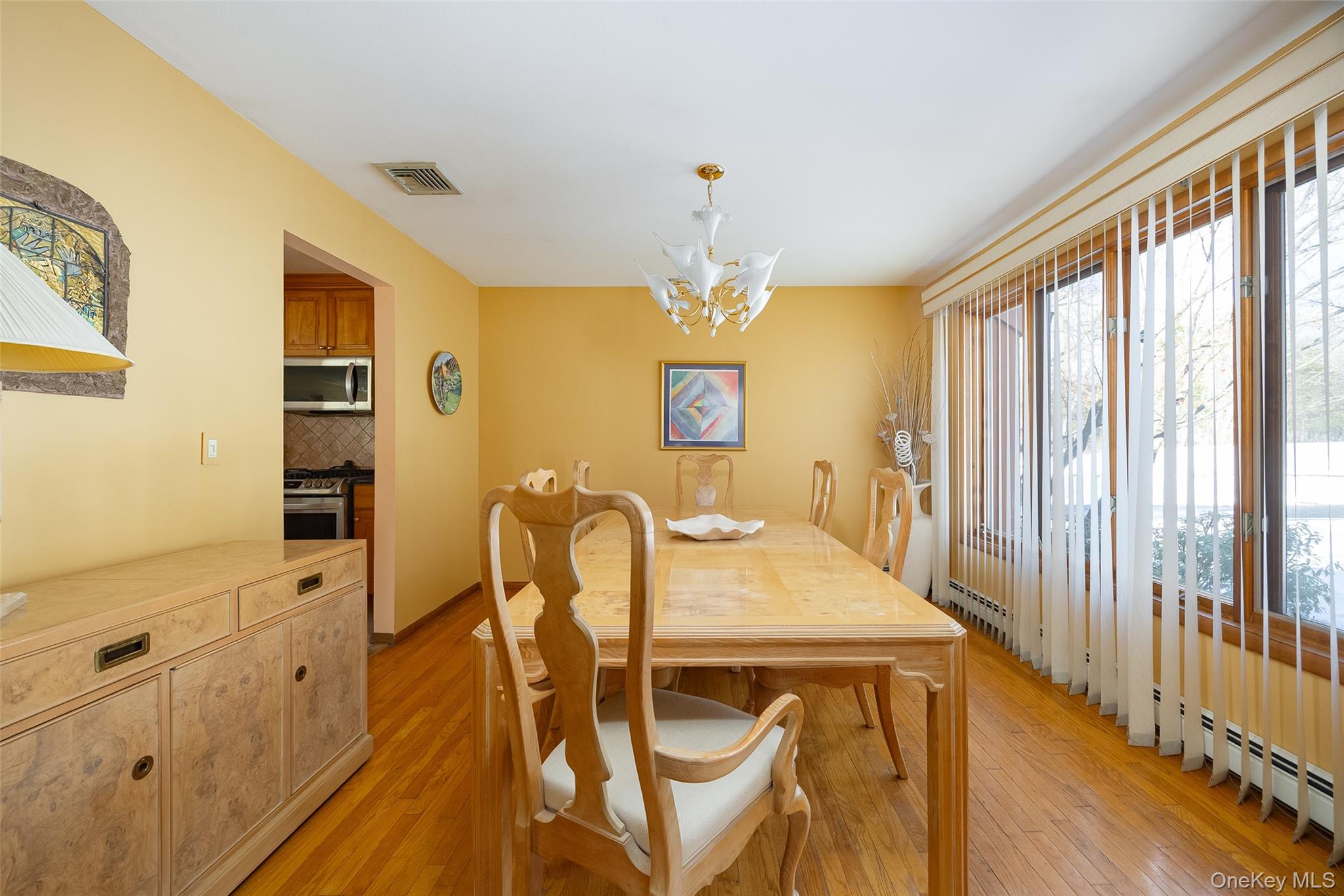 5 Chestnut Ridge Road Poughkeepsie, NY 12603 - Photo 13 of 39 a view of a dining room with furniture window and wooden floor